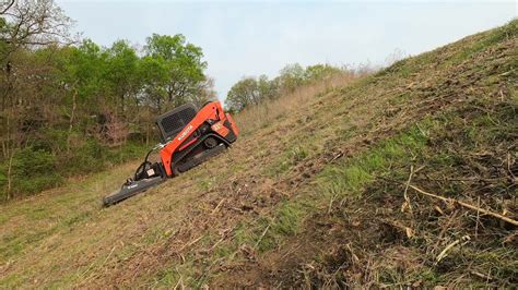 using a skid steer on a slope|slopes mowing with skids.